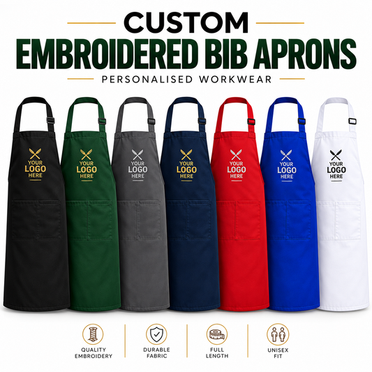 Six customizable bib aprons in different colors (black, green, gray, navy, red, white) lined up horizontally on a white background, featuring the text 'CUSTOM EMBROIDERED BIB APRONS' at the top and feature icons at the bottom.