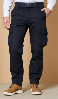 Person wearing navy cargo pants with a beige background