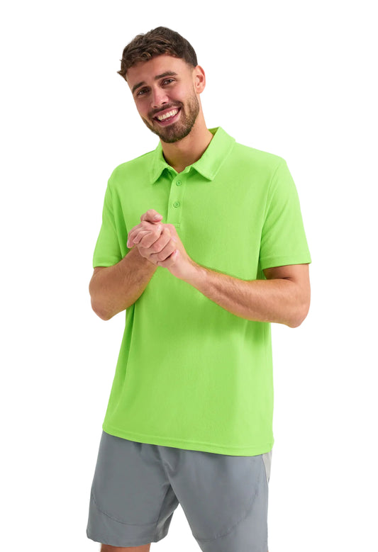 Man wearing a Uneek UC125 bright green polo shirt and gray shorts on a white background