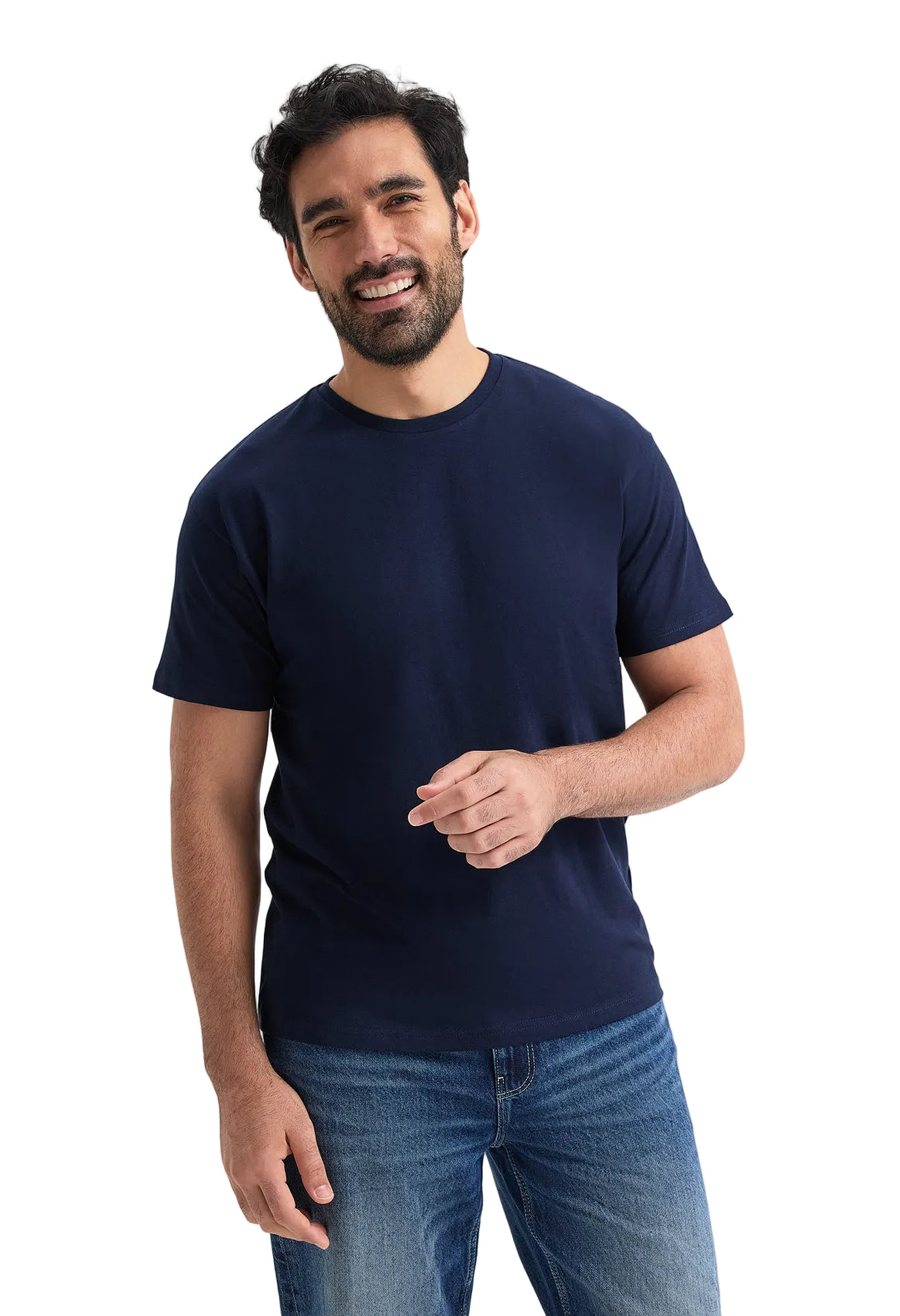 Man wearing a navy blue t-shirt and jeans on a white background